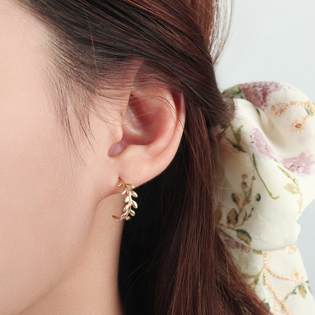 Our Delicate Leaf Patterned Golden Studs STS-3715