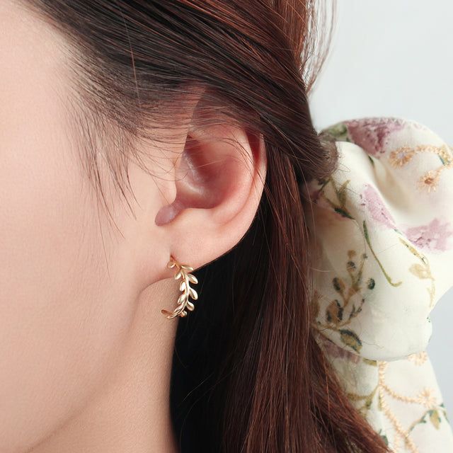 Our Delicate Leaf Patterned Golden Studs STS-3715